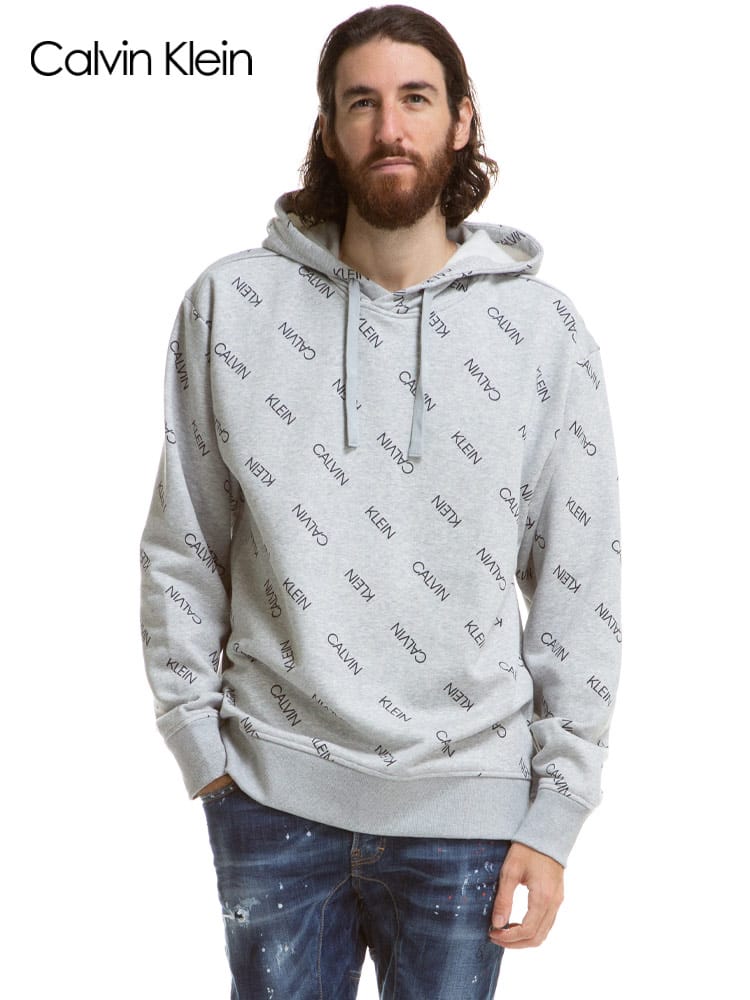 Calvin Klein (カルバンクライン) 裏起毛 総ロゴプリント プルオーバー パーカー CK41VC214 メンズ スウェット