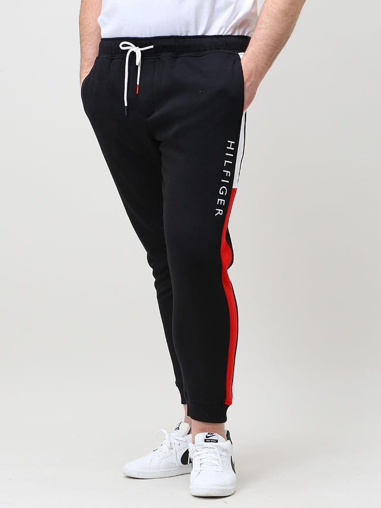 大きいサイズ メンズ TOMMY HILFIGER (トミーヒルフィガー) 裏起毛 サイドロゴ スウェットパンツ QUINN COLOR BLOCK JOGGER