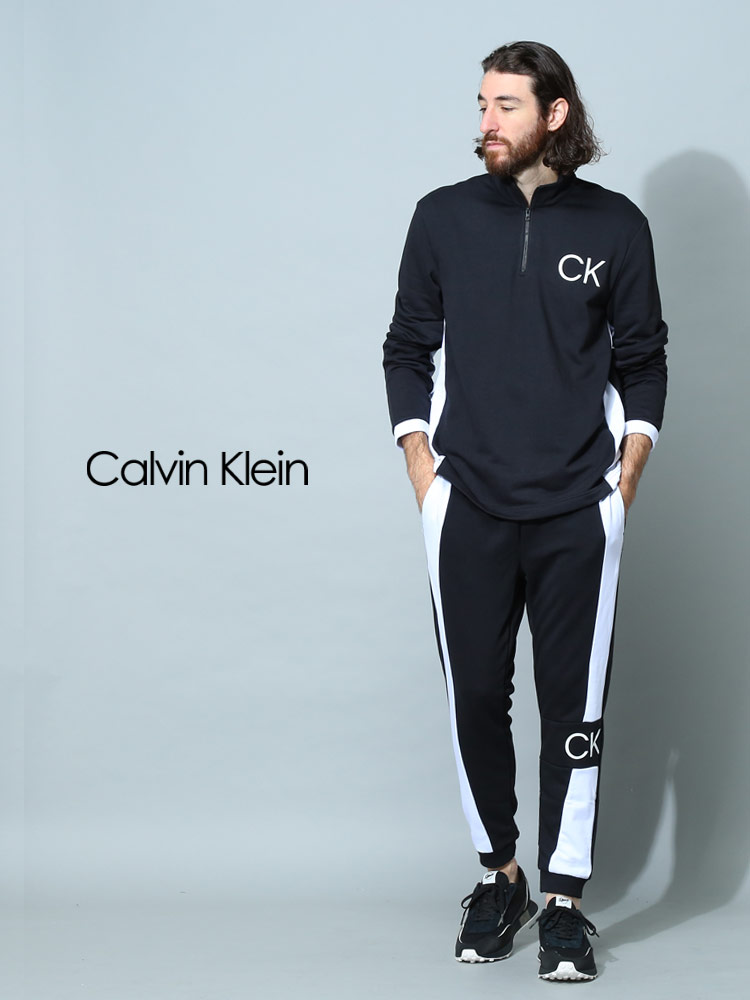 Calvin Klein (カルバンクライン) ハーフジップ 胸ロゴ 長袖 プル ...