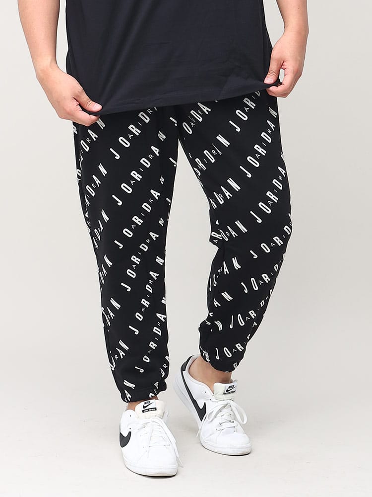 大きいサイズ メンズ NIKE (ナイキ) 裏起毛 総柄プリント スウェットパンツ J ESS AOP GFX FLC PANT