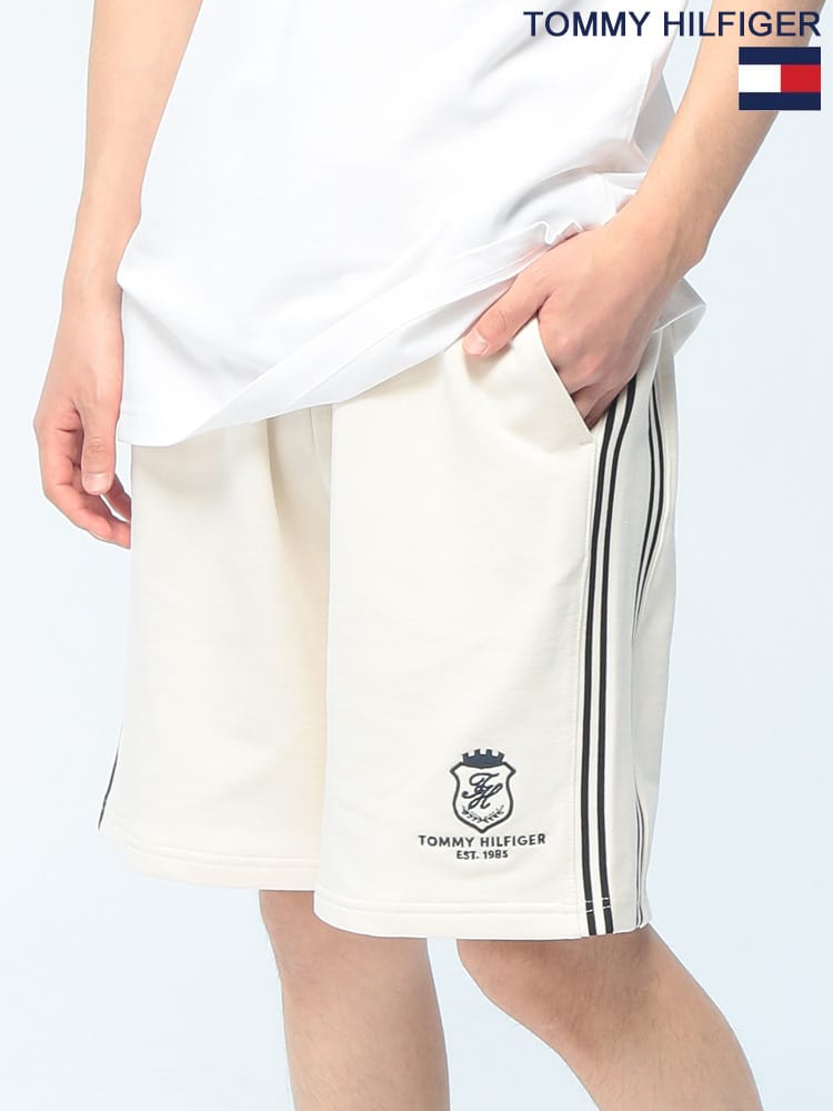 TOMMY HILFIGER (トミーヒルフィガー)　ショートパンツ 裾ロゴ 刺繍 サイドライン MW0MW42878 スウェット ハーフパンツ ユニセックス 
